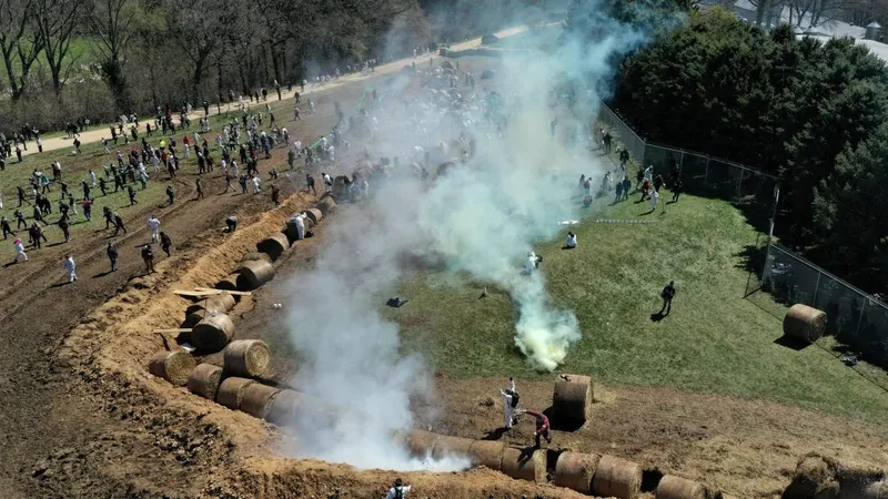 About 1,000 animal welfare activists tried to storm a beagle research facility protected by a manure-filled trench, hay bales and barbed-wire fence